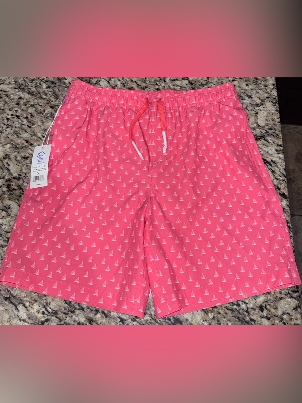 Boys Southern Tide Coral Sailboat Swim Trunks